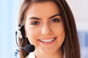 smiling call center agent with long brown hair