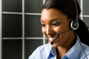 smiling call center agent handling call
