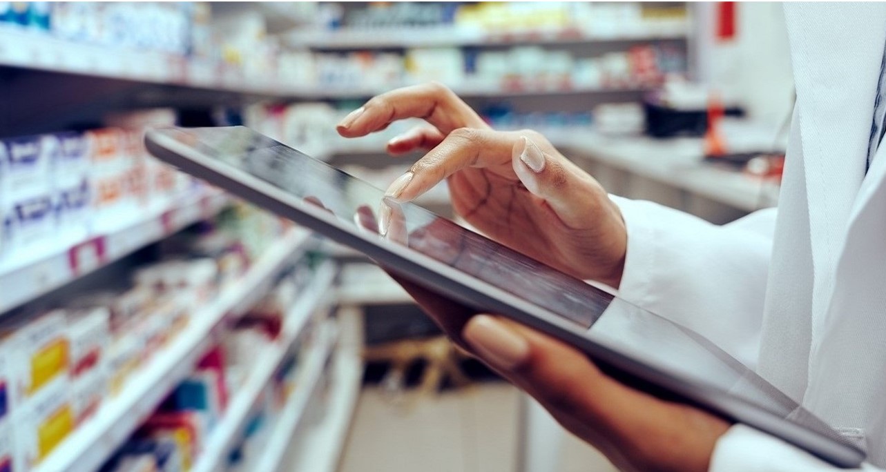 Pharmacist looking at an iPad