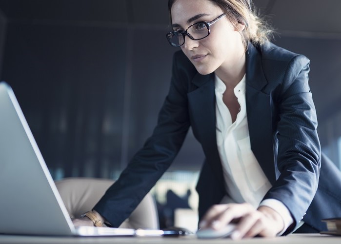 Businesswoman working on the laptop