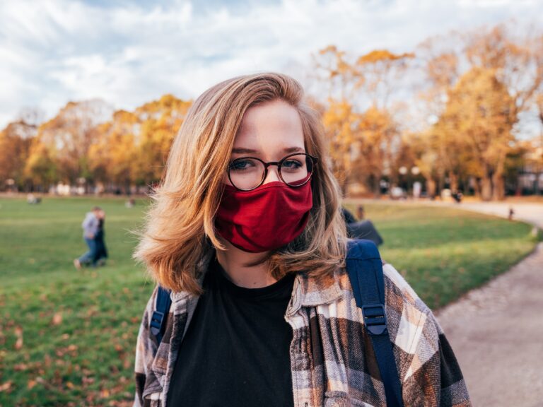 masked student on campus Emergency Management