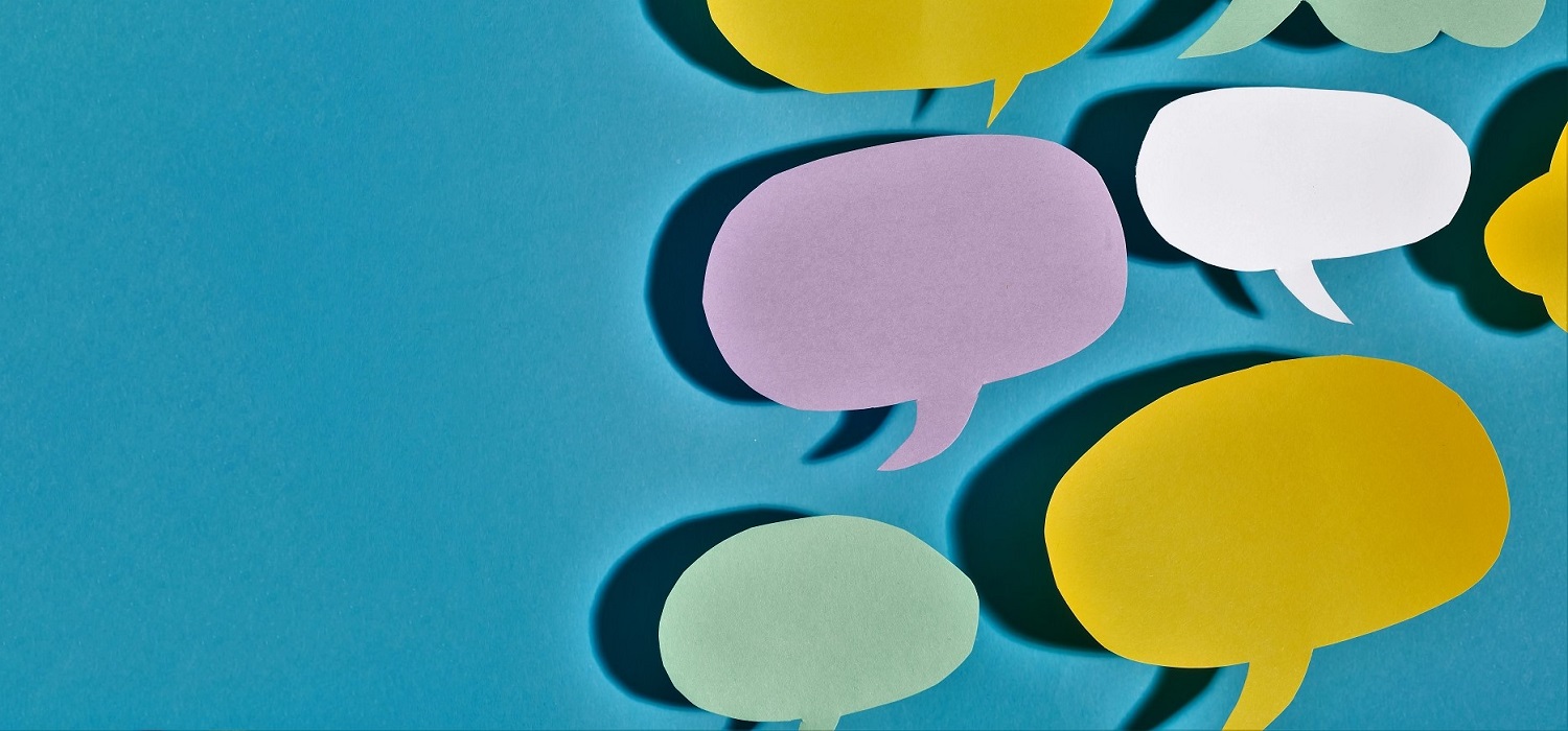 automated text message - blue background with a mass of multi-colored speech bubbles